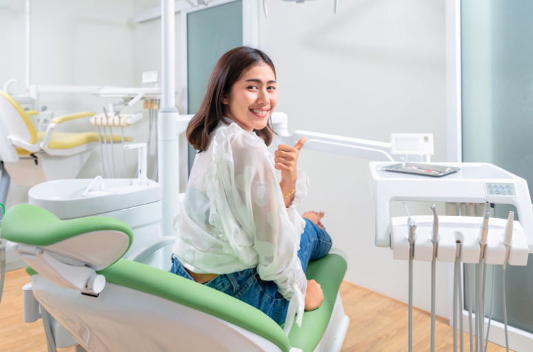 Dentist performing a dental check-up in Johnstone at Cloud Dental.