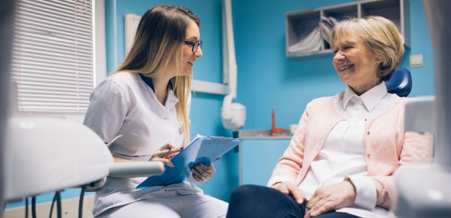 Patient receiving urgent care from an emergency dentist in Johnstone for immediate dental relief and treatment